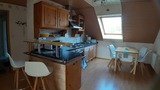 Ferienwohnung in L&uuml;tjenbrode - Residence Strandl&auml;ufer - Die Wohnk&uuml;che mit Bar und Tresen